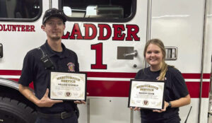 Two Harvest volunteer firefighters recognized for heroic actions