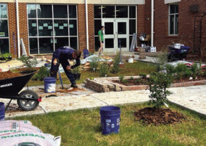 Volunteers construct, landscape Outdoor Classroom for Midtown Elementary