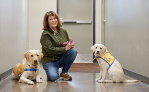 PUPPY LOVE: Monique Melton raises Canine Companions puppies that go on to serve those in need